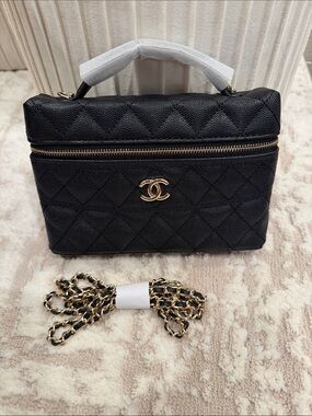 Chanel makeup bag (8” long x 5” height)